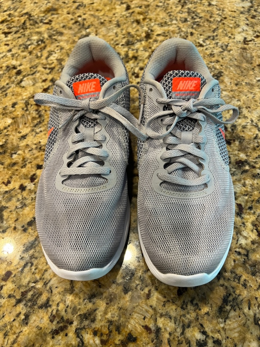 Nike Light Gray Mesh Sneakers with Orange Logo Accents; clean; lots of wear left